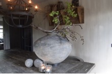 Authentieke grijze tuimelkruik