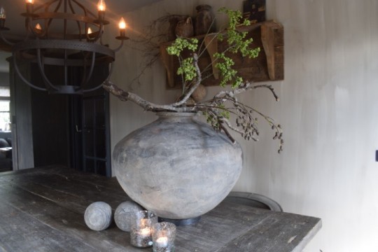 Authentieke grijze tuimelkruik