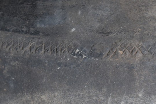 Authentieke grijze tuimelkruik