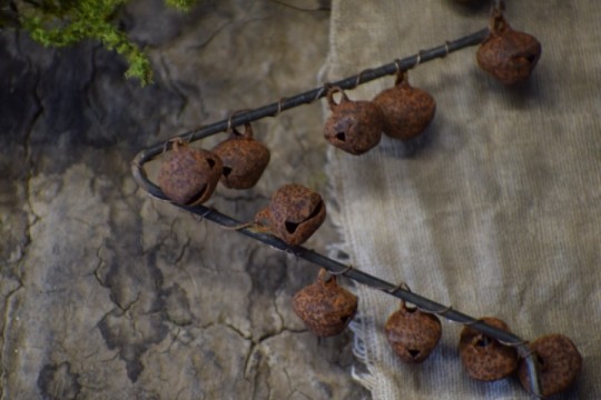 Kerstster met roestige belletjes