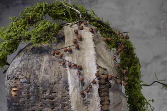 Kerstster met roestige belletjes