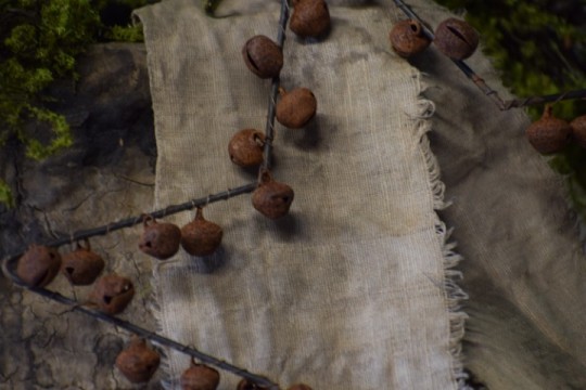 Kerstster met roestige belletjes klein